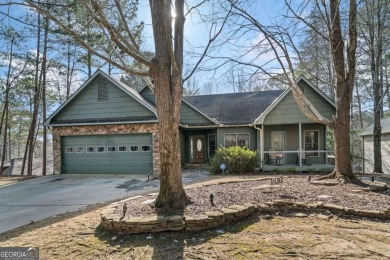 Welcome to your own slice of paradise! This charming waterfront on The Highlands Course at Lake Arrowhead in Georgia - for sale on GolfHomes.com, golf home, golf lot