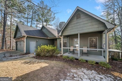 Welcome to your own slice of paradise! This charming waterfront on The Highlands Course at Lake Arrowhead in Georgia - for sale on GolfHomes.com, golf home, golf lot