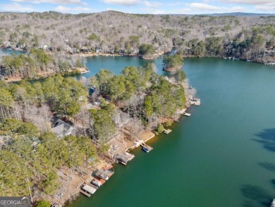 Welcome to your own slice of paradise! This charming waterfront on The Highlands Course at Lake Arrowhead in Georgia - for sale on GolfHomes.com, golf home, golf lot