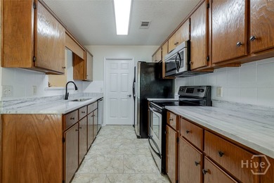 Step into the charm of Lost Plantation with this beautiful on Lost Plantation Golf Club in Georgia - for sale on GolfHomes.com, golf home, golf lot