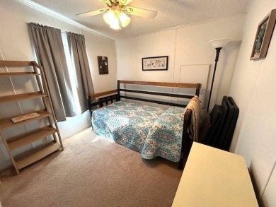 Discover this beautifully maintained 2-bedroom, 2-bathroom home on Crystal Lake Club in Florida - for sale on GolfHomes.com, golf home, golf lot