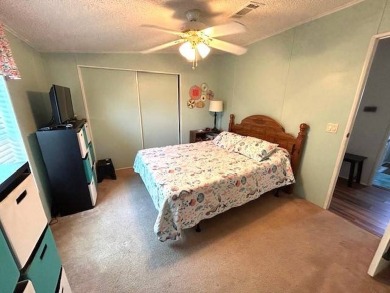 Discover this beautifully maintained 2-bedroom, 2-bathroom home on Crystal Lake Club in Florida - for sale on GolfHomes.com, golf home, golf lot