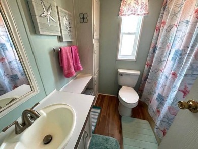 Discover this beautifully maintained 2-bedroom, 2-bathroom home on Crystal Lake Club in Florida - for sale on GolfHomes.com, golf home, golf lot