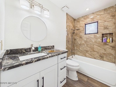 Two-story Southwestern-style home on a golf course with mountain on Pueblo Del Sol Country Club in Arizona - for sale on GolfHomes.com, golf home, golf lot