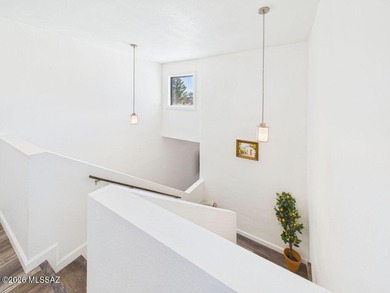 Two-story Southwestern-style home on a golf course with mountain on Pueblo Del Sol Country Club in Arizona - for sale on GolfHomes.com, golf home, golf lot