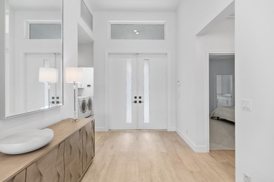 MOVE IN READY..Step into this beautifully renovated patio home on Frenchmans Creek Country Club in Florida - for sale on GolfHomes.com, golf home, golf lot