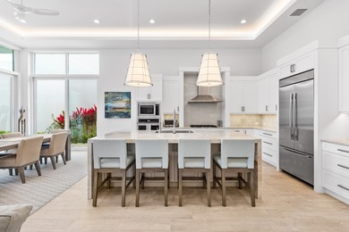 MOVE IN READY..Step into this beautifully renovated patio home on Frenchmans Creek Country Club in Florida - for sale on GolfHomes.com, golf home, golf lot