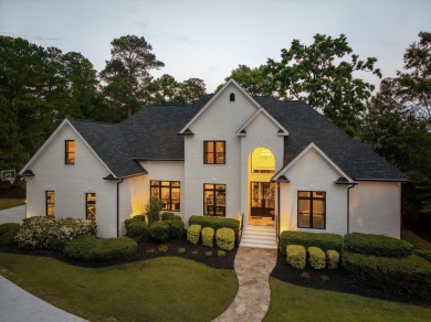 Welcome to luxury living on the largest lot in Riverwood on Champions Retreat Golf Club in Georgia - for sale on GolfHomes.com, golf home, golf lot