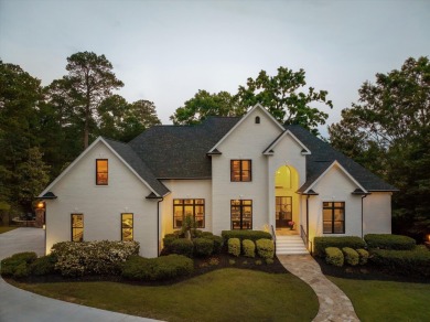 Welcome to luxury living on the largest lot in Riverwood on Champions Retreat Golf Club in Georgia - for sale on GolfHomes.com, golf home, golf lot