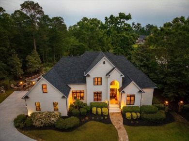 Welcome to luxury living on the largest lot in Riverwood on Champions Retreat Golf Club in Georgia - for sale on GolfHomes.com, golf home, golf lot
