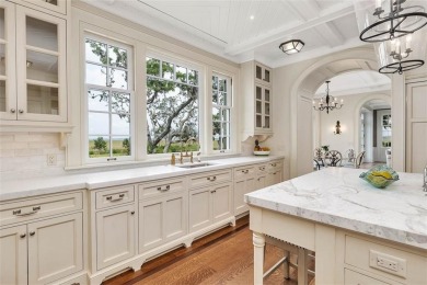 The *crown jewel* of Sea Island living, this estate is located on Sea Island Golf Club in Georgia - for sale on GolfHomes.com, golf home, golf lot