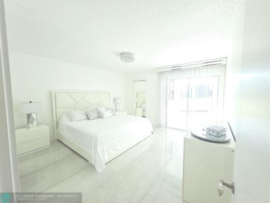 STUNNINGLY REMODELED 2BR/2BA CONDO, REIMAGINED WITH NO EXPENSE on Wynmoor Golf Course in Florida - for sale on GolfHomes.com, golf home, golf lot