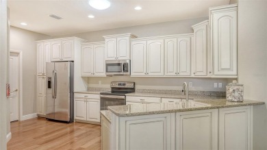 RARELY AVAILABLE END UNIT WITH UNOBSTRUCTED, PEACEFUL AND on Legacy Golf Club in Florida - for sale on GolfHomes.com, golf home, golf lot