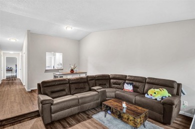Tucked away behind a private fence, this beautifully updated on Mesquite Municipal Golf Course in Texas - for sale on GolfHomes.com, golf home, golf lot