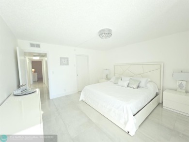 STUNNINGLY REMODELED 2BR/2BA CONDO, REIMAGINED WITH NO EXPENSE on Wynmoor Golf Course in Florida - for sale on GolfHomes.com, golf home, golf lot