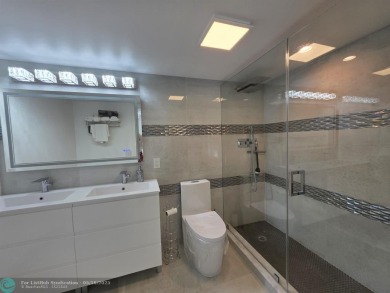 STUNNINGLY REMODELED 2BR/2BA CONDO, REIMAGINED WITH NO EXPENSE on Wynmoor Golf Course in Florida - for sale on GolfHomes.com, golf home, golf lot