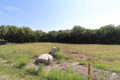 Discover this prime 2.18-acre building site in an exclusive new on Great Life Golf At the Junction City Country Club in Kansas - for sale on GolfHomes.com, golf home, golf lot