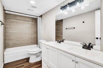 Tucked away behind a private fence, this beautifully updated on Mesquite Municipal Golf Course in Texas - for sale on GolfHomes.com, golf home, golf lot