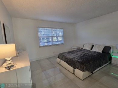 STUNNINGLY REMODELED 2BR/2BA CONDO, REIMAGINED WITH NO EXPENSE on Wynmoor Golf Course in Florida - for sale on GolfHomes.com, golf home, golf lot