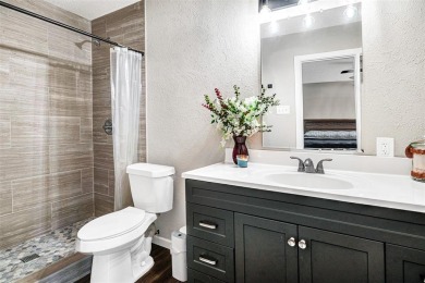 Tucked away behind a private fence, this beautifully updated on Mesquite Municipal Golf Course in Texas - for sale on GolfHomes.com, golf home, golf lot