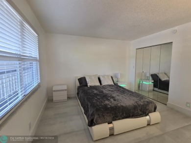 STUNNINGLY REMODELED 2BR/2BA CONDO, REIMAGINED WITH NO EXPENSE on Wynmoor Golf Course in Florida - for sale on GolfHomes.com, golf home, golf lot