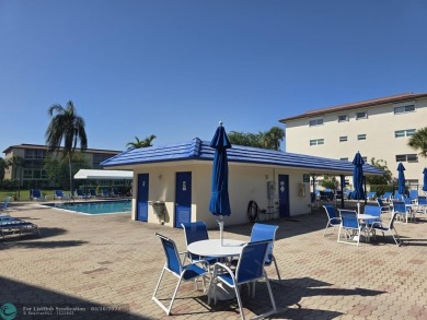 STUNNINGLY REMODELED 2BR/2BA CONDO, REIMAGINED WITH NO EXPENSE on Wynmoor Golf Course in Florida - for sale on GolfHomes.com, golf home, golf lot