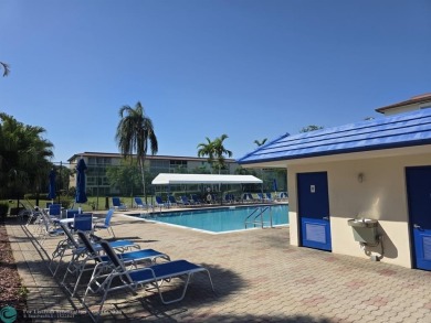 STUNNINGLY REMODELED 2BR/2BA CONDO, REIMAGINED WITH NO EXPENSE on Wynmoor Golf Course in Florida - for sale on GolfHomes.com, golf home, golf lot