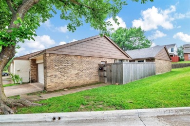 Tucked away behind a private fence, this beautifully updated on Mesquite Municipal Golf Course in Texas - for sale on GolfHomes.com, golf home, golf lot