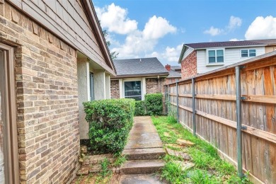 Tucked away behind a private fence, this beautifully updated on Mesquite Municipal Golf Course in Texas - for sale on GolfHomes.com, golf home, golf lot
