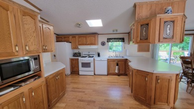 Can you imagine living on a golf course, accessing the on Maplewood Golf Course in Wisconsin - for sale on GolfHomes.com, golf home, golf lot