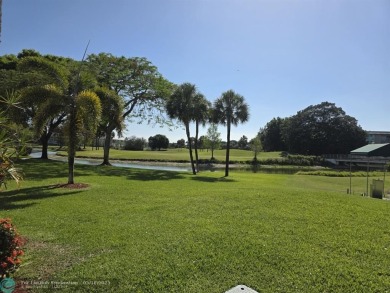 STUNNINGLY REMODELED 2BR/2BA CONDO, REIMAGINED WITH NO EXPENSE on Wynmoor Golf Course in Florida - for sale on GolfHomes.com, golf home, golf lot