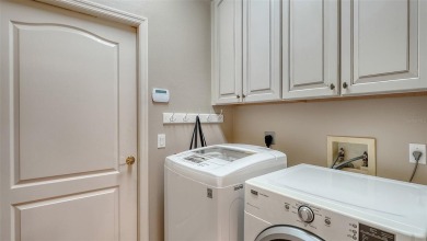 RARELY AVAILABLE END UNIT WITH UNOBSTRUCTED, PEACEFUL AND on Legacy Golf Club in Florida - for sale on GolfHomes.com, golf home, golf lot