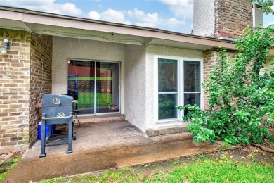 Tucked away behind a private fence, this beautifully updated on Mesquite Municipal Golf Course in Texas - for sale on GolfHomes.com, golf home, golf lot