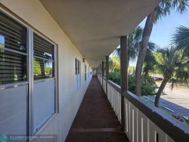 STUNNINGLY REMODELED 2BR/2BA CONDO, REIMAGINED WITH NO EXPENSE on Wynmoor Golf Course in Florida - for sale on GolfHomes.com, golf home, golf lot