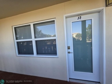 STUNNINGLY REMODELED 2BR/2BA CONDO, REIMAGINED WITH NO EXPENSE on Wynmoor Golf Course in Florida - for sale on GolfHomes.com, golf home, golf lot