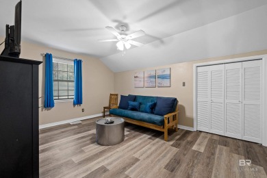 Located in Wedgewood Estates, this Gulf Shores retreat with a on The Golf Club of the Wharf in Alabama - for sale on GolfHomes.com, golf home, golf lot