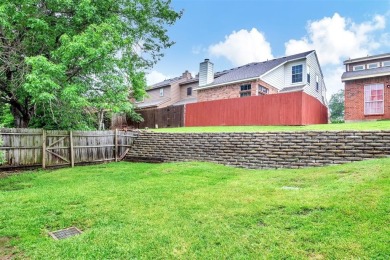 Tucked away behind a private fence, this beautifully updated on Mesquite Municipal Golf Course in Texas - for sale on GolfHomes.com, golf home, golf lot