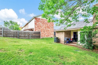 Tucked away behind a private fence, this beautifully updated on Mesquite Municipal Golf Course in Texas - for sale on GolfHomes.com, golf home, golf lot
