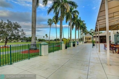 STUNNINGLY REMODELED 2BR/2BA CONDO, REIMAGINED WITH NO EXPENSE on Wynmoor Golf Course in Florida - for sale on GolfHomes.com, golf home, golf lot
