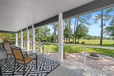 Located in Wedgewood Estates, this Gulf Shores retreat with a on The Golf Club of the Wharf in Alabama - for sale on GolfHomes.com, golf home, golf lot