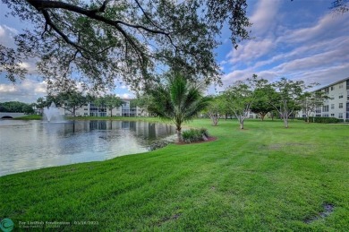 STUNNINGLY REMODELED 2BR/2BA CONDO, REIMAGINED WITH NO EXPENSE on Wynmoor Golf Course in Florida - for sale on GolfHomes.com, golf home, golf lot