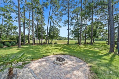 Located in Wedgewood Estates, this Gulf Shores retreat with a on The Golf Club of the Wharf in Alabama - for sale on GolfHomes.com, golf home, golf lot