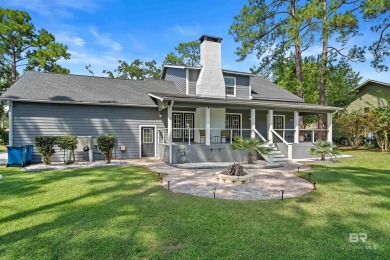 Located in Wedgewood Estates, this Gulf Shores retreat with a on The Golf Club of the Wharf in Alabama - for sale on GolfHomes.com, golf home, golf lot