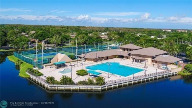 STUNNINGLY REMODELED 2BR/2BA CONDO, REIMAGINED WITH NO EXPENSE on Wynmoor Golf Course in Florida - for sale on GolfHomes.com, golf home, golf lot