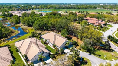 RARELY AVAILABLE END UNIT WITH UNOBSTRUCTED, PEACEFUL AND on Legacy Golf Club in Florida - for sale on GolfHomes.com, golf home, golf lot