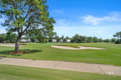 Located in Wedgewood Estates, this Gulf Shores retreat with a on The Golf Club of the Wharf in Alabama - for sale on GolfHomes.com, golf home, golf lot