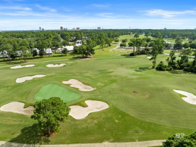 Located in Wedgewood Estates, this Gulf Shores retreat with a on The Golf Club of the Wharf in Alabama - for sale on GolfHomes.com, golf home, golf lot
