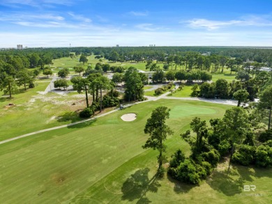 Located in Wedgewood Estates, this Gulf Shores retreat with a on The Golf Club of the Wharf in Alabama - for sale on GolfHomes.com, golf home, golf lot