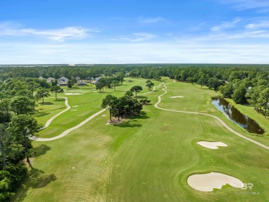 Located in Wedgewood Estates, this Gulf Shores retreat with a on The Golf Club of the Wharf in Alabama - for sale on GolfHomes.com, golf home, golf lot