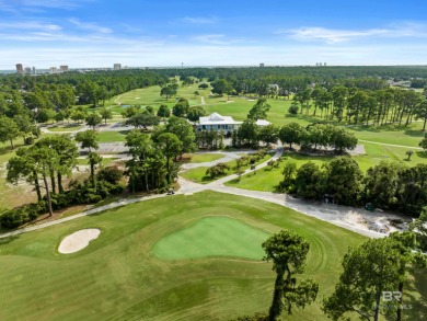 Located in Wedgewood Estates, this Gulf Shores retreat with a on The Golf Club of the Wharf in Alabama - for sale on GolfHomes.com, golf home, golf lot